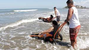 Praias Promovem Inclusão De Pessoas Com Deficiência. Pcd. Turismo Para Pessoas Com Deficiência